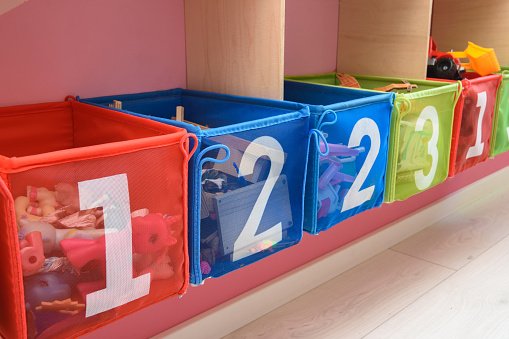 multi-colored boxes with numbers filled with little toys